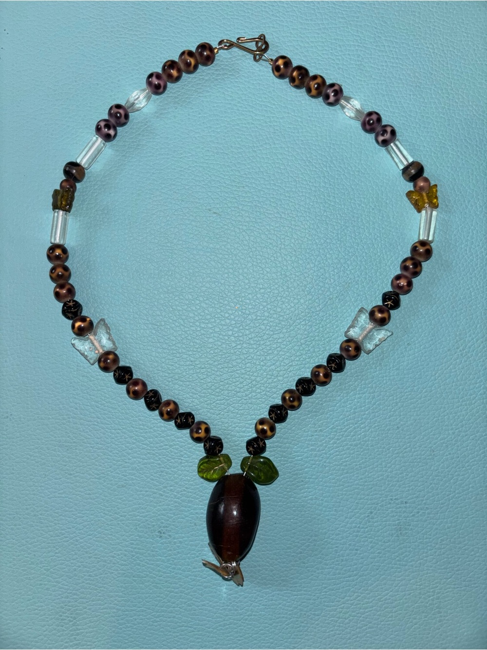Brown Beaded Pendant Necklace with Green Accents